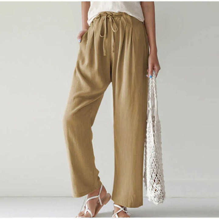 Gretel - Pantalon respirant avec taille élastique et poche plissée tendance sur des jambes évasées