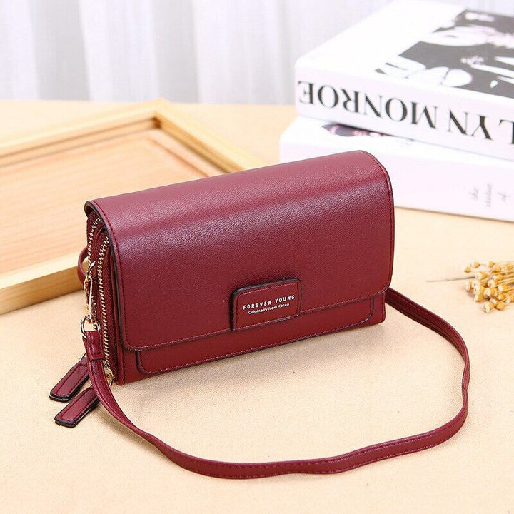 Sac en cuir synthétique élégant et classique pour un style intemporel.